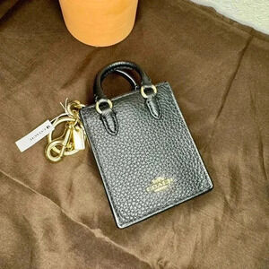 NWT Coach North/South Mini Tote Bag Charm Earbud Holder Trendy Tiny Purse